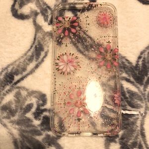 This phone case is pretty who’s pink flowers on it